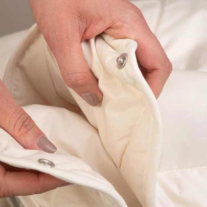 Variante mit Druckknoepfe Kombi Bettdecke Schurwolle