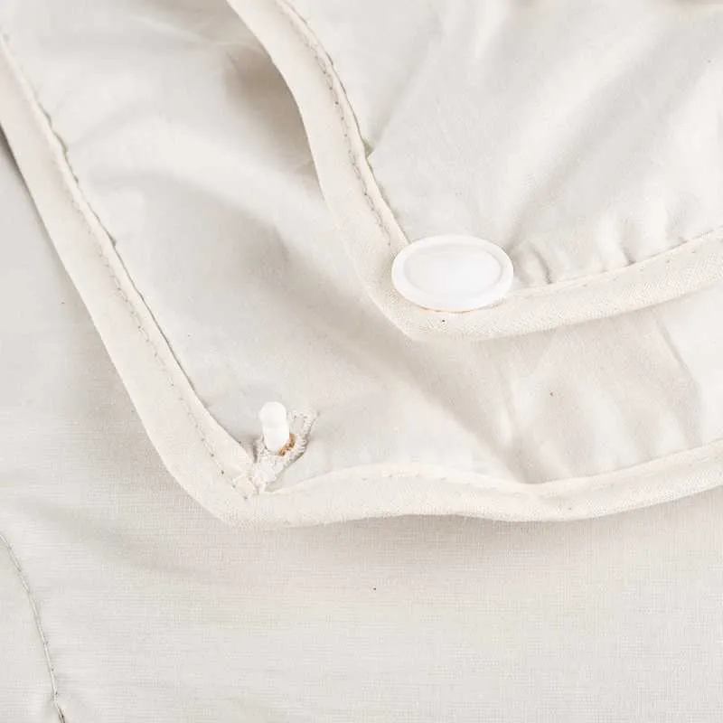 Variante mit Knöpfen Tencel bettdecke bio 4 jahreszeiten warm weich kuschelig Steckknöpfe grünvergnügt by purnatour